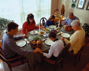 Family Praying Before Dinner
